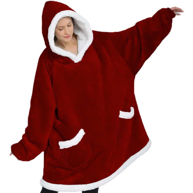 Red hoodie with white trim worn by a person on a white background
