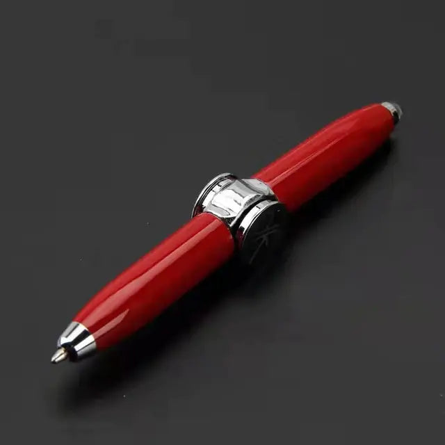 Red pen with silver accents on a black background