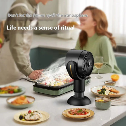 Black air purifier on a kitchen counter with people and food in the background