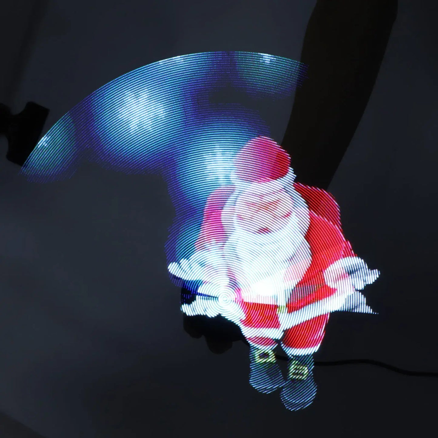 LED light display of a Santa Claus figure on a dark background