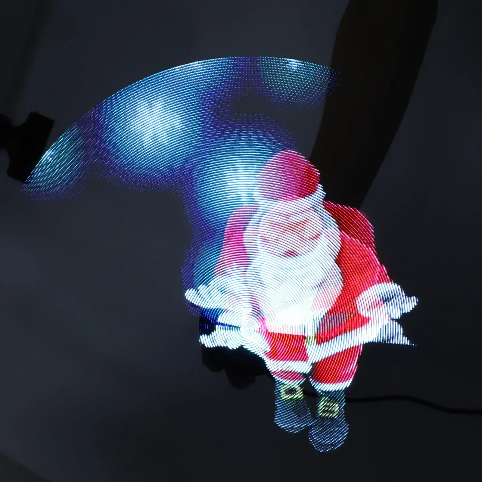 LED light display of a Santa Claus figure on a dark background