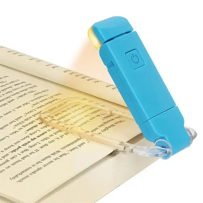 Blue booklight illuminating a page of a book on a white background